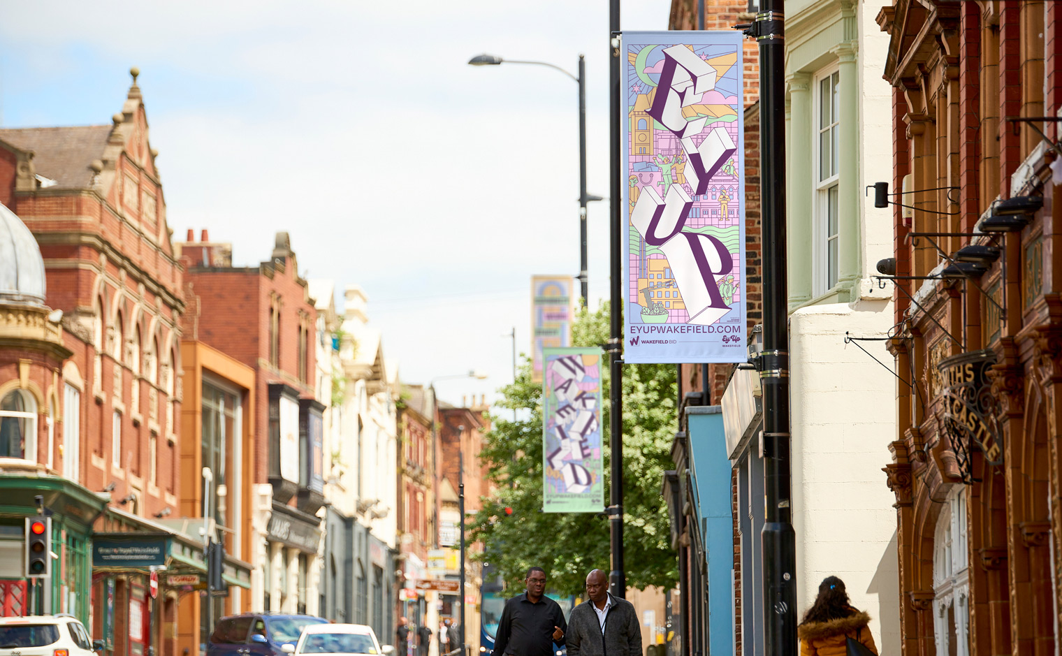 'Ey Up Wakefield' City Centre Lamppost Flag Banners for Wakefield BID - View of Westgate