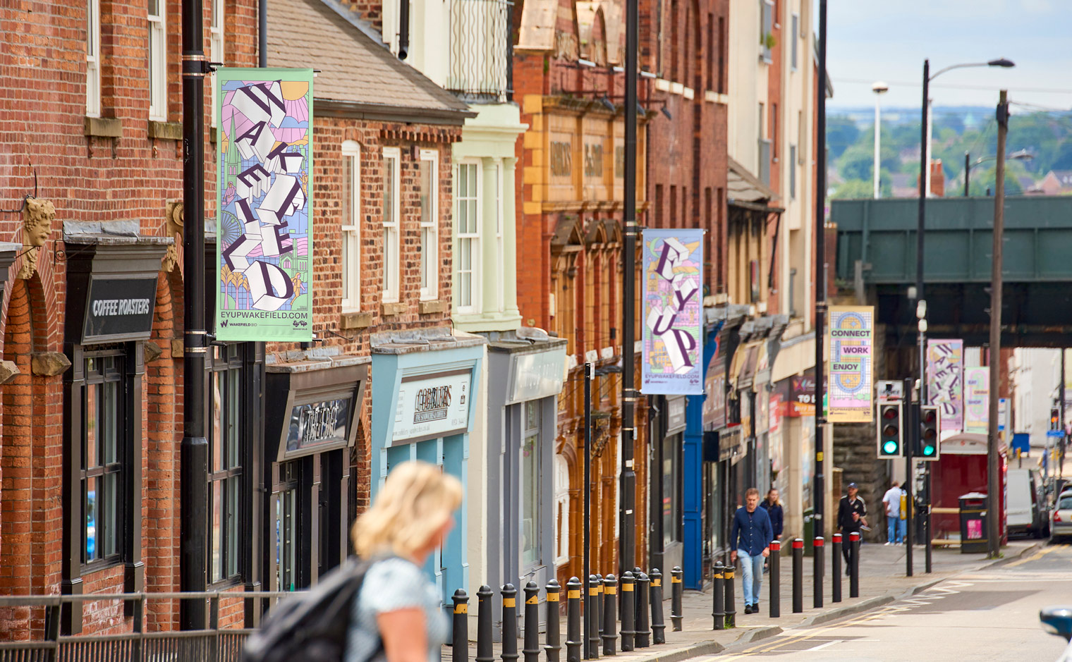 'Ey Up Wakefield' City Centre Lamppost Flag Banners for Wakefield BID - View of Westgate